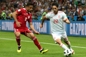 KAZAN, RUSSIA - JUNE 20:  Isco of Spain runs with the ball under pressure from Omid Ebrahimi of Iran during the 2018 FIFA World Cup Russia group B match between Iran and Spain at Kazan Arena on June 20, 2018 in Kazan, Russia.  (Photo by Francois Nel/Getty Images)