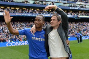 LONDON, ENGLAND - MAY 13:  Didier Drogba and Frank Lampard of Chelsea applaud the fans during the Barclays Premier League match between Chelsea and Blackburn Rovers at Stamford Bridge on May 13, 2012 in London, England.  (Photo by Darren Walsh/Chelsea FC via Getty Images)