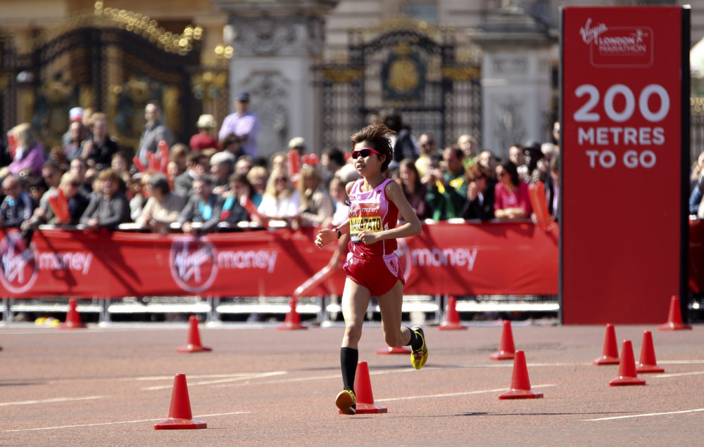 LONDON, ENGLAND - APRIL 21: Remi Nakazato of Japan makes her way down the mall during the Virgin London Marathon 2013 on April 21, 2013 in London, England. (Photo by Ben Hoskins/Getty Images)
